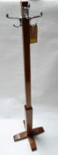 An Art Deco walnut coat stand, H.154cm