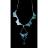 A sterling silver and enamelled buttefly drop necklace in shades of turquoise and navy blue