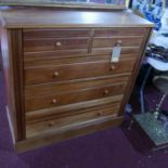 A late Victorian satinwood and walnut chest, two short over three long drawers, H.102 W.103 D.47cm