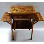 An Arts & Crafts walnut three tier side table, inlaid with images of parrots, signed with initials
