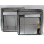 A pair of Industrial bathroom swing mirrors, H.70 W.70 D.20cm