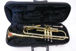 A Juptier brass trumpet in carry case