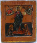 A Russian icon depicting Jesus to center flanked by Cherubim and Seraphim and with two kneeling