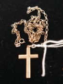 A 9ct gold chain together with a yellow metal cross