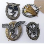 Four reproduction Third Reich Luftwaffe badges, including Luftwaffe Paratrooper Combat Badge