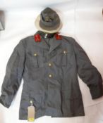 A vintage Austrian army uniform, comprising trousers, jacket and cap, together with an Austrian army