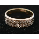 An 18ct yellow gold and diamond ring, inset with 16 diamonds, marked 750