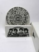 A Beatles Coalport porcelain letter rack, with Sgt Pepper design, in original box