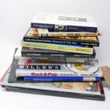 A collection of 13 collectors books