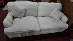 A contemporary two seater sofa