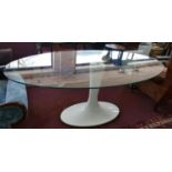 A tulip style dining table with oval glass top, H.78 W.202 D.106cm