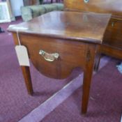 A Georgian mahogany bedside commode, converted to storage