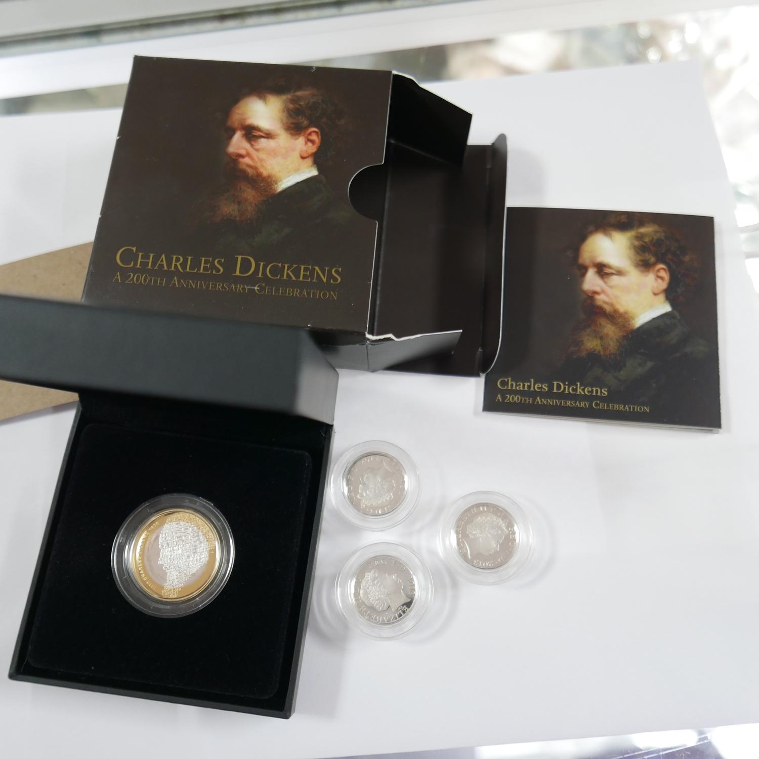 A Royal Mint £2 coin celebrating the 200th Anniversary of the birth of Charles Dickens in original - Image 2 of 3