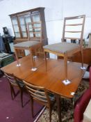 A Danish teak dining table, with two butterfly leaves, together with six chairs, H.74 W.164 D.