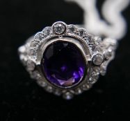 A sterling silver, amethyst and white sapphire cluster ring, Size: N, 3g.