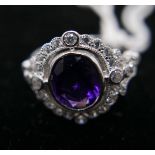 A sterling silver, amethyst and white sapphire cluster ring, Size: N, 3g.