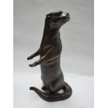 A cast bronze otter, H.53cm