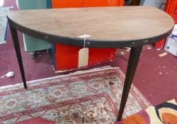 A Industrial demi lune table, on square tapered legs, H.76 W.140 D.71cm