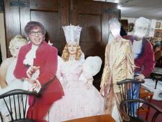 Five life size cardboard cut outs of Elvis, Marilyn Monroe, James Dean, Austin Powers and the Good