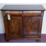 An early 19th century mahogany Chiffonier, two drawers over two cupboard doors, raised on bracket