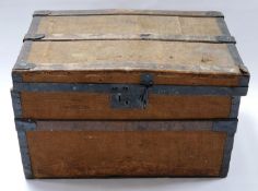 An antique iron bound and canvas trunk, H.42 W.71 D.43cm