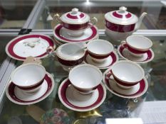 A part porcelain tea service marked M.K, handle on tea pot broken