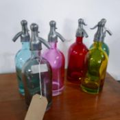 A set of six multi-coloured glass soda syphons, H.33cm (6)