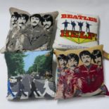 Four Beatles scatter cushions