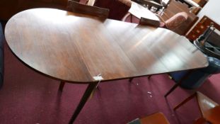 A mid 20th century N&R Mobler Danish exotic hardwood D-end dining table, with 2 leaves, removable