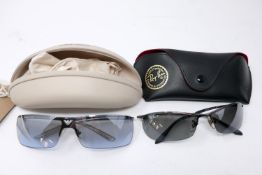 A pair of Ray Ban sunglasses with case, together with a pair of Armani sun glasses in case