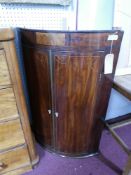 A Georgian mahogany corner cabinet, with boxwood inlay and ivory escutcheons