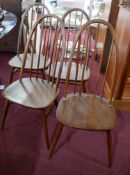 A set of four mid 20th century Ercol dining chairs