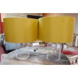 Two large glass lamps with lime green shades, H.55cm