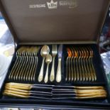 A Bestecke Solingen (SBS) gold plated cutlery set in carry case