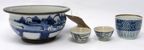 Four pieces of late 19th/early 20th century Chinese blue and white porcelain to include 3 cups and a