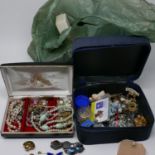 A large collection of costume jewellery, to include brooches, necklaces, earrings, etc., together