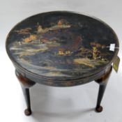 A 1920's black lacquered Chinosserie coffee table, H.42 Diameter 67cm