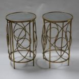 A pair of gilt metal contemporary lamp tables, with circular mirrored tops, H.60cm Diameter 35cm (2)