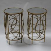 A pair of gilt metal contemporary lamp tables, with circular mirrored tops, H.60cm Diameter 35cm (2)