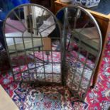A pair of contemporary arched garden mirrors, H.77 W.48cm (2)