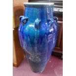 A Persian blue glazed Sharab wine vessel, H.92cm