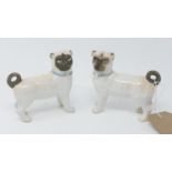 A pair of Staffordshire models of pugs