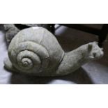 A stone snail ornament, H.26 W.54 D.27cm