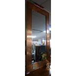 A large contemporary rectangular copper mirror, with bevelled plate, 180 x 90cm
