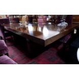 A contemporary hardwood extending dining table, bought from Gotham interiors of Notting Hill, H.80