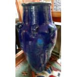 A Persian blue glazed Sharab wine vessel, H.90cm