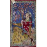 A Persian pictorial rug, depicting a lady feeding birds under a tree, fringed, 102 x 57cm