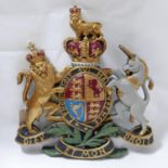 A painted fiberglass armorial crest, 75 x 67cm