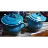 A pair of Persian turquoise glazed pots and covers, with rope twist design handles, H.39cm (2)