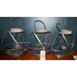 A set of three contemporary candles holders, H.34cm